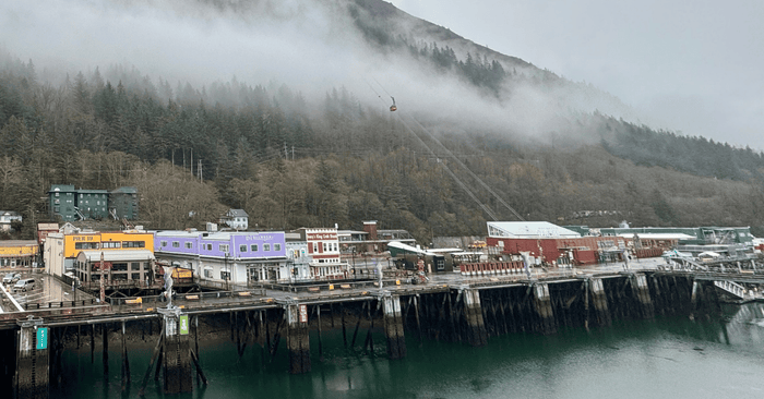Pier at Juneau. Colourful buildings and Mount Roberts in the background.