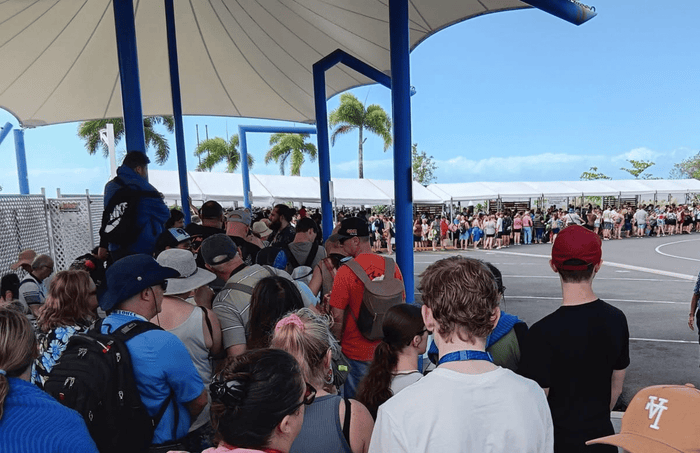 Large line of people waiting for tenders at Yorkeys Knob